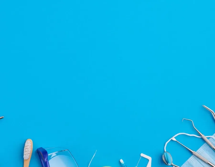 Several dental tools resting on a tabletop